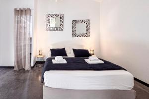 En eller flere senge i et værelse på Villa Ixora - Piscine Privée + 28 billeder