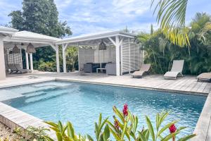 Swimmingpoolen hos eller tæt på Villa Ixora - Piscine Privée