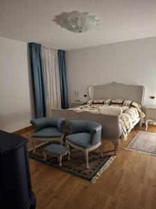 Ένα ή περισσότερα κρεβάτια σε δωμάτιο στο Il Borgo By Phoenix