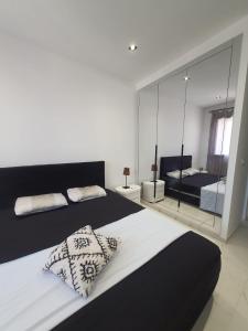 En eller flere senge i et værelse på Cozy place apartement