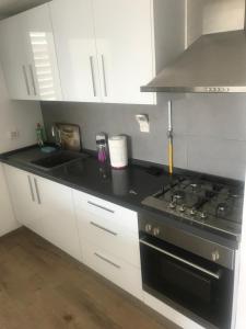 Køkken eller tekøkken på Cozy place apartement