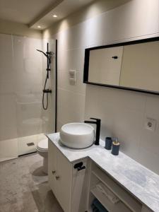 Koupelna v ubytování Atidos