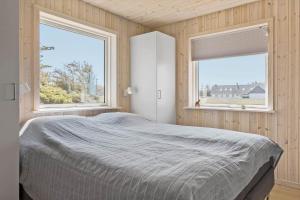 Postel nebo postele na pokoji v ubytování 1051-Thisted-Skjaerbakken-57