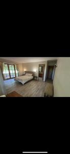 En eller flere senge i et værelse på Countryside retreat getaway