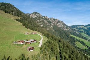 an aerial view of a house on a mountain at Ferienhütte Alpenherz in Alpbach