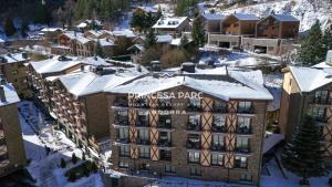an aerial view of a hotel in the snow at Hotel Princesa Parc in Arinsal