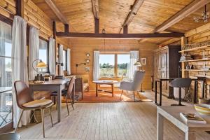 a dining room with a table and chairs in a room at 309-Bedsted-Thy-Redningsvej-9 in Bedsted Thy