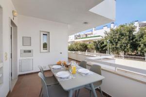 En balkon eller terrasse på 1I Apt Alecrim