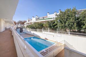 Swimmingpoolen hos eller tæt på 1I Apt Alecrim