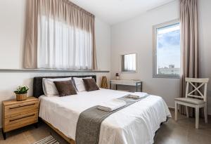 Postel nebo postele na pokoji v ubytování Chrystal Residences