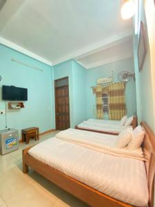 TV a/nebo společenská místnost v ubytování Kim Tinh Hostel