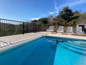 Swimmingpoolen hos eller tæt på Casa Siempre feliz