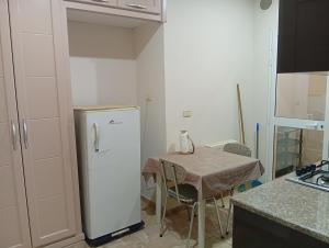 Kuchyň nebo kuchyňský kout v ubytování Lovely Paradise + 11 fotografií