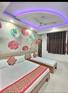 Postel nebo postele na pokoji v ubytování Agam homestay- Few steps walk From Golden Temple