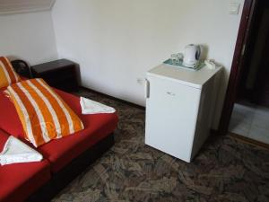 Kuchyň nebo kuchyňský kout v ubytování Aranyhídszálló