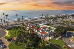 an aerial view of a resort with palm trees and the ocean at 4BR Beach Condo Kids Hideaway Walk to Beach Casino Ole Hanson in San Clemente