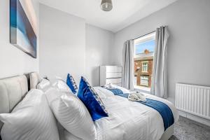 En eller flere senge i et værelse på Stay Menorca Bolton