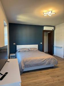 Кровать или кровати в номере Lanzo Belvedere