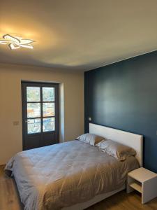 Кровать или кровати в номере Lanzo Belvedere +12 фотографий