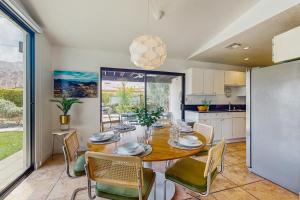 a kitchen and dining room with a table and chairs at Jewel of the Desert 259-342 in La Quinta