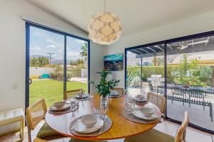 a dining room with a table and a large window at Jewel of the Desert 259-342 in La Quinta