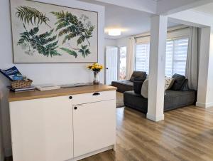 Et opholdsområde på Condo #3 - 2 min Bord de l'eau Billard & Barbecue