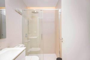 a bathroom with a shower and a toilet and a sink at Stancia Benimaclet - Studio 7 in Valencia +12 photos