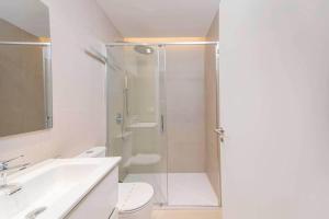 a bathroom with a shower and a toilet and a sink at Stancia Benimaclet - Studio 11 in Valencia