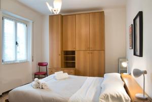 Ένα ή περισσότερα κρεβάτια σε δωμάτιο στο Garden - residence in the center of Barzio +96 φωτογραφίες