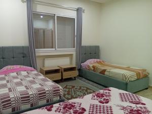 Ένα ή περισσότερα κρεβάτια σε δωμάτιο στο Paradise Rose