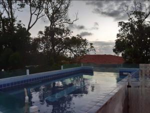 Swimmingpoolen hos eller tæt på Recanto da Praia