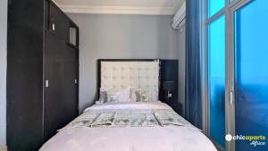 Postel nebo postele na pokoji v ubytování Chic apart with parking and pool + 16 fotografií