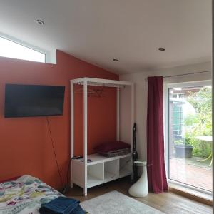 Ένα ή περισσότερα κρεβάτια σε δωμάτιο στο One-room apartment near Rheine Lingen