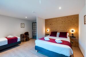 Postel nebo postele na pokoji v ubytování Hôtel Restaurant Le Madame + 61 fotografií