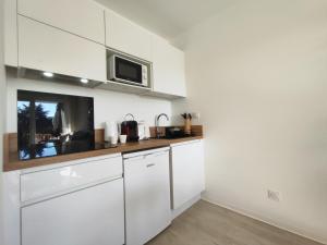 Køkken eller tekøkken på Appartement Tennis Cap d'Agde, Wellness 220