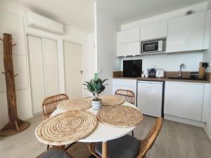 Køkken eller tekøkken på Appartement Tennis Cap d'Agde, Wellness 220