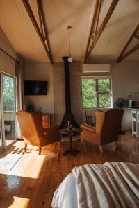 Et opholdsområde på Sunbird Cabin at Vrolikheid Landgoed