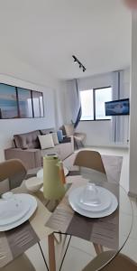 Χώρος καθιστικού στο Lindo Apartamento Vista para o Mar. (2 quartos)