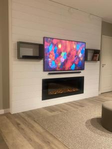 Et tv og/eller underholdning på Ruka Village, 4BR Suite A27, 133m2