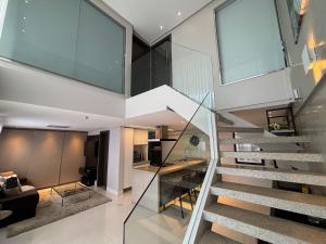 Et tv og/eller underholdning på Flats no Mercure Belém Boulevard