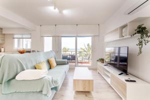 Μια τηλεόραση ή/και κέντρο ψυχαγωγίας στο Encalma Vacacional siente disfruta vive la playa