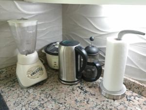 Příslušenství pro přípravu čaje a kávy v ubytování Cerroazulfarmlodge