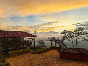 a view of a mountain with a view of the sky at Hospedandote Emuná Chicamocha in Los Santos +12 photos