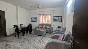 Posezení v ubytování Imperial Homestay