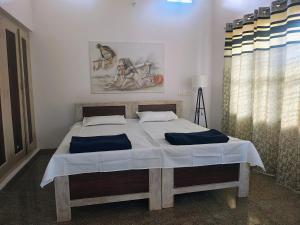 Postel nebo postele na pokoji v ubytování Anava Farms