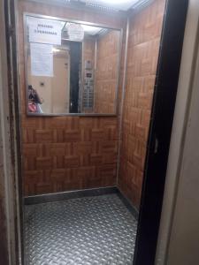 a bathroom with a mirror and a walk in shower at Mendoza in Barraquero