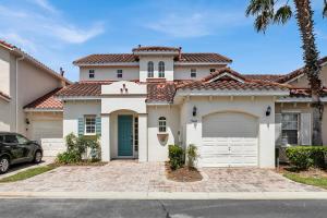 a large white house with a garage at Much Needed Private Relaxation Home in Davenport