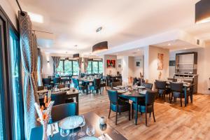 Posezení v ubytování Hôtel Restaurant Le Madame