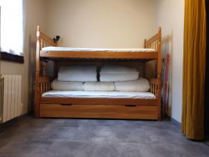 En eller flere senge i et værelse på Bel appartement 2 pièces en RDC