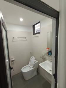 Koupelna v ubytování The Full House + 4 fotografie